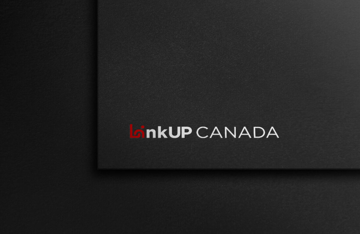 Black business card with the logo 'LinkUp CANADA' in white and red font on a textured dark background.