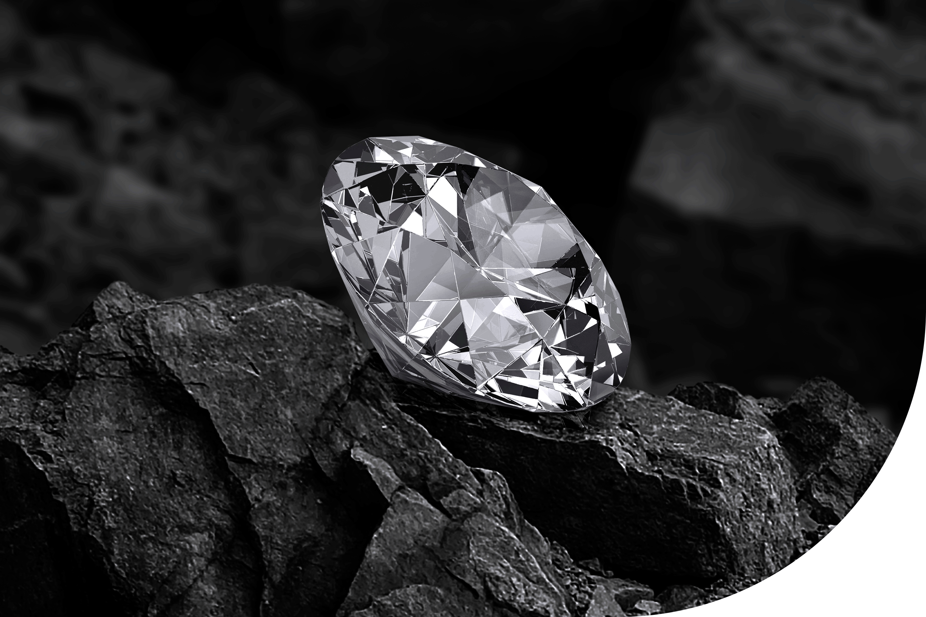 A sparkling diamond resting on a rugged, dark rock, presented in black and white, highlighting its intricate facets and brilliant shine.